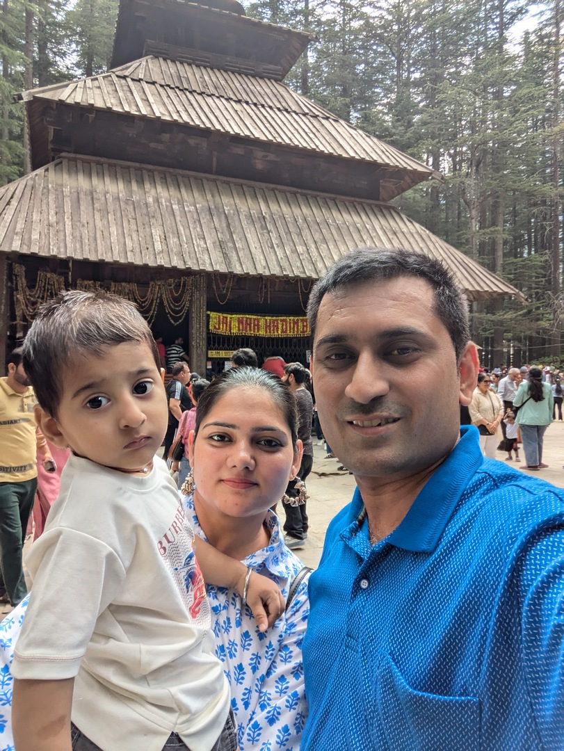 Family photo at Hadimba Temple, Manali